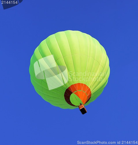 Image of balloon flying in blue sky