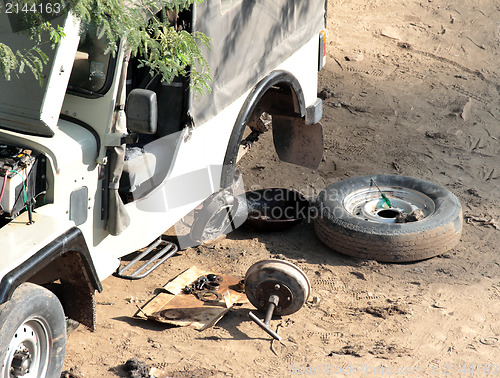 Image of car repairs on road