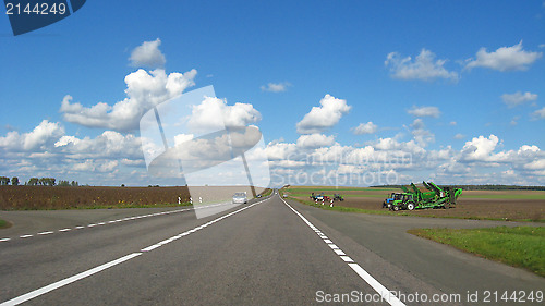 Image of The asphalted road and the blue sky