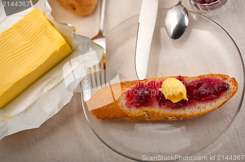 Image of bread butter and jam 