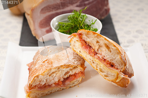 Image of ciabatta panini sandwich with parma ham and tomato