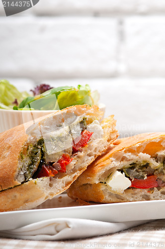 Image of ciabatta panini sandwichwith vegetable and feta