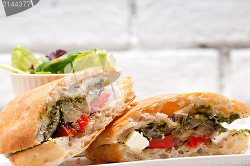 Image of ciabatta panini sandwichwith vegetable and feta