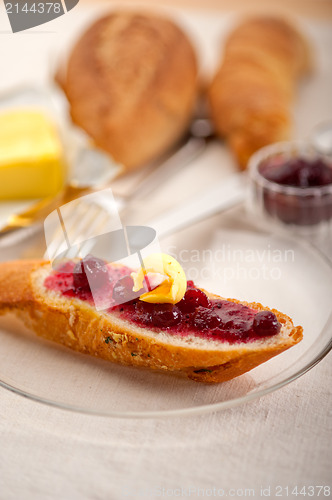 Image of bread butter and jam 