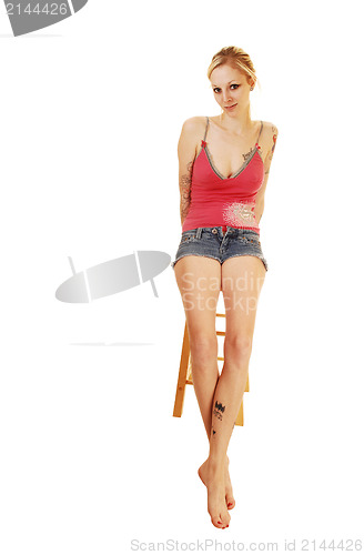 Image of Young woman in shorts.