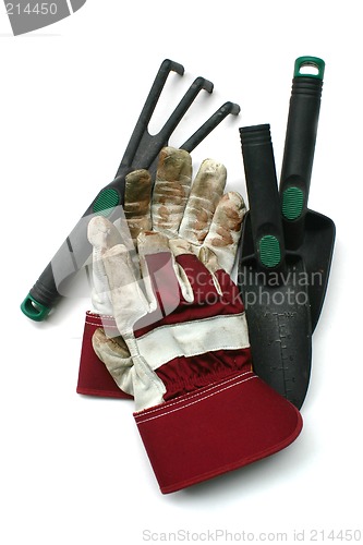 Image of Used gardening / work gloves and tools