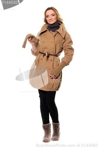 Image of Pretty young woman in coat