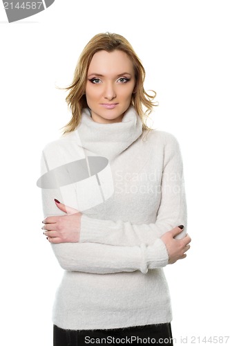 Image of nice young woman in white sweater