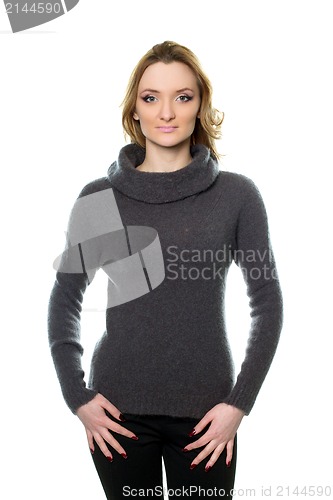 Image of cute young woman in sweater