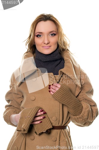 Image of young woman in coat