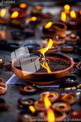 Image of Burning candles in the Indian temple.