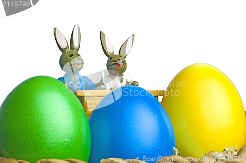 Image of easter basket with painted eggs and bunnies