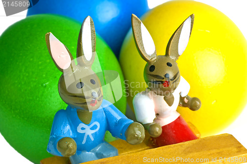 Image of easter basket with painted eggs and bunnies