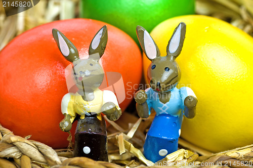 Image of easter basket with painted eggs and bunnies