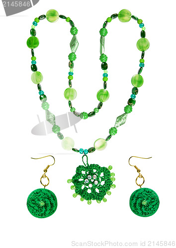 Image of beads and earrings from plastic, wood, yarn glass