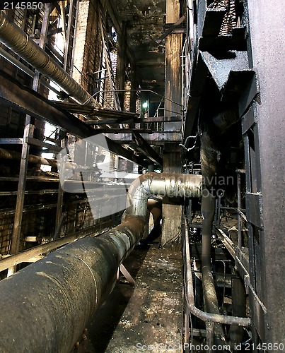 Image of Old creepy, dark, decaying, destructive, dirty factory