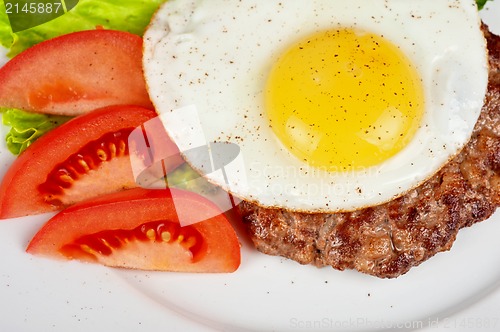 Image of steak beef meat with fried egg