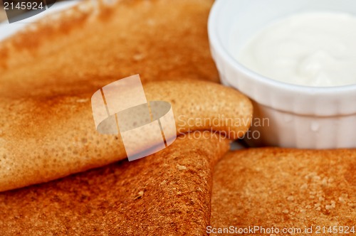 Image of pancakes with sour cream