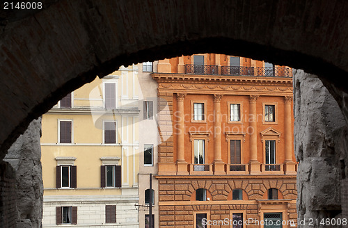 Image of Buildings in Rome Framed by Colosseum Arch