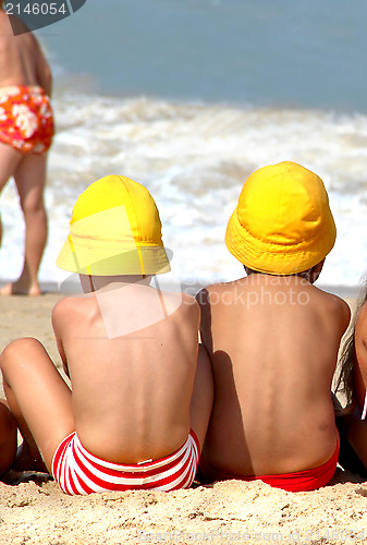 Image of Two cute small children on the beach