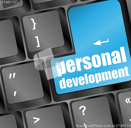 Image of Keyboard with blue enter button personal development