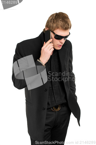 Image of Man talking on the phone