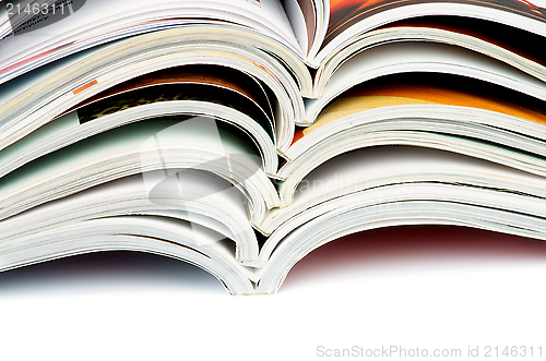 Image of Stack of Open Magazines