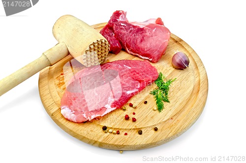 Image of Meat repulsed with wooden mallet