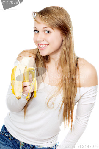 Image of Playful woman holding banana