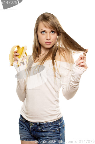 Image of Woman playing with hair