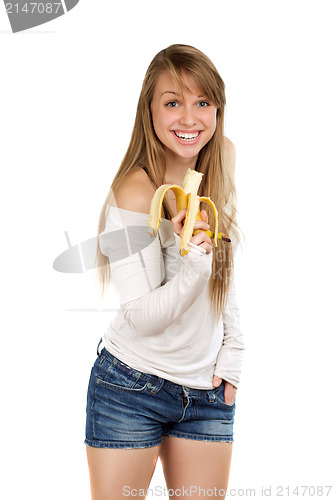 Image of Joyful woman holding banana