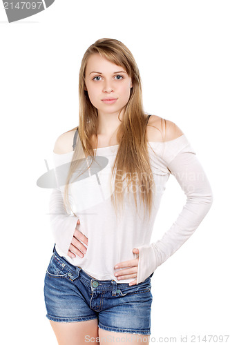 Image of Blond woman touching tummy