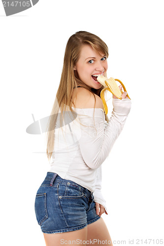 Image of Woman eating banana