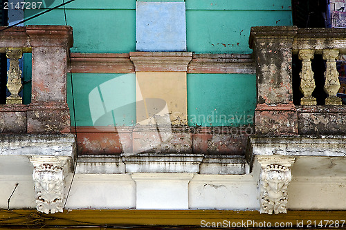 Image of two old light green terrace  