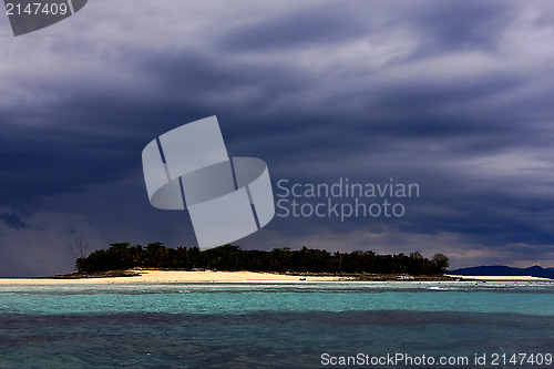 Image of  cloudy hill  and boat