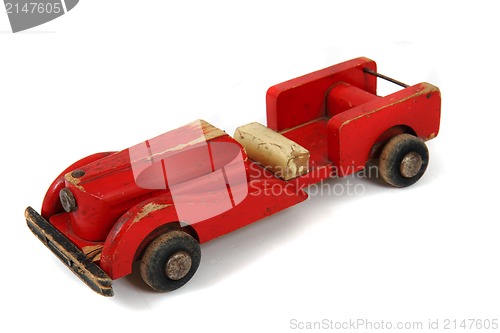 Image of old red car toy 