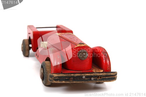 Image of old red car toy 