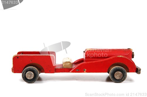 Image of old red car toy 