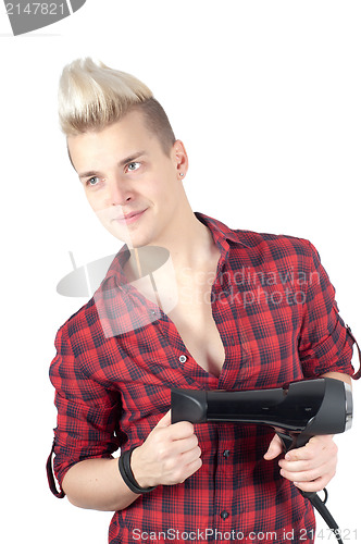 Image of Portrait of handsome man in red with hairdryer