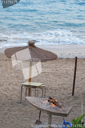 Image of Umbrella on the beach in sunset