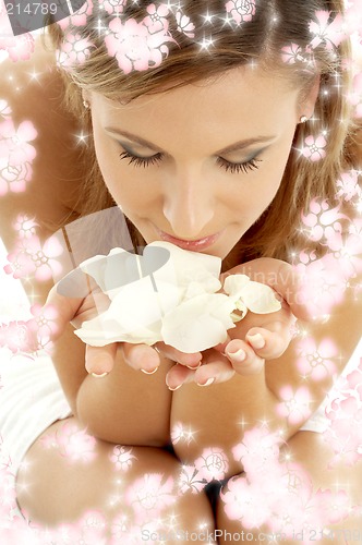 Image of rose petals with small flowers