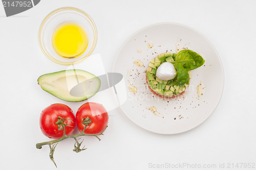 Image of Tomatoes, avocado and olive oil