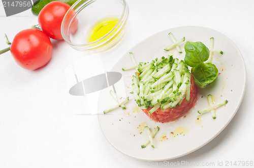 Image of Tomatoes, avocado and olive oil
