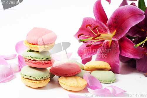Image of Rose petals and macaron cookies