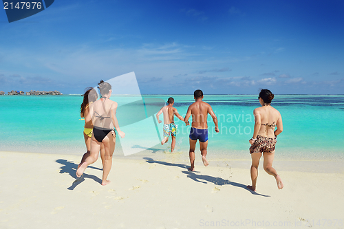 Image of group of happy young people have fun on bach