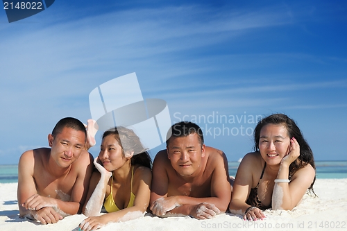 Image of group of happy young people have fun on bach