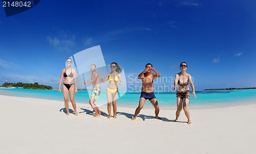 Image of group of happy young people have fun on bach