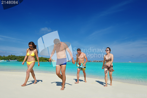 Image of group of happy young people have fun on bach
