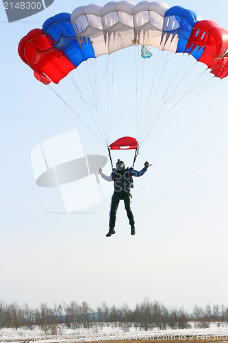 Image of Parachutist Jumper in the helmet after the jump