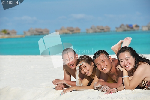 Image of group of happy young people have fun on bach